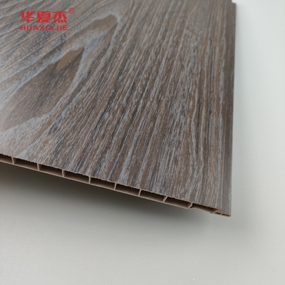 Vendita in grosso di pannelli di pareti in PVC a grano di legno scuro impermeabili a umidità pannelli di soffitto in PVC Decorazione per ufficio