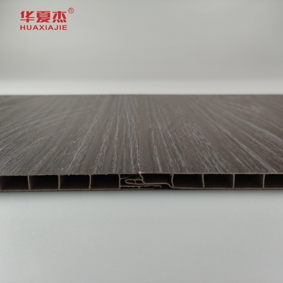 Vendita in grosso di pannelli di pareti in PVC a grano di legno scuro impermeabili a umidità pannelli di soffitto in PVC Decorazione per ufficio