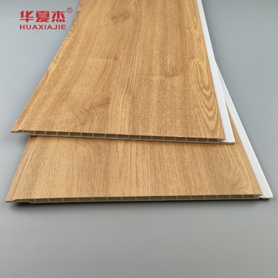 Al dettaglio pannelli murali in pvc a grana di legno pannelli di soffitto in pvc antigraffi per la decorazione residenziale