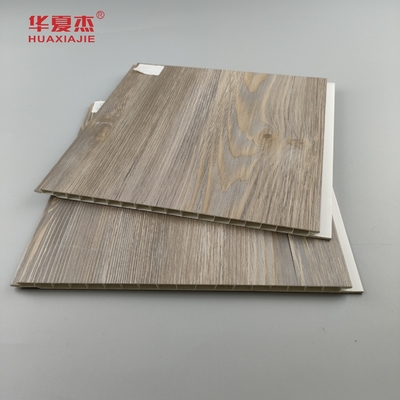 Fabbrica vendita diretta pannello di parete in Pvc legno stratificato grani di legno Pvc decorazione pannello di soffitto residenziale / ufficio