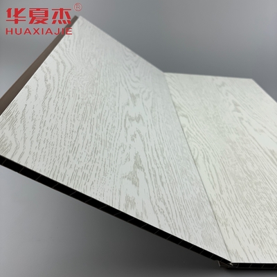 Best seller pannello di parete in pvc bianco stratificato pannello di decorazione del soffitto in pvc a grano di legno simulato per appartamento