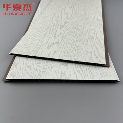 Best seller pannello di parete in pvc bianco stratificato pannello di decorazione del soffitto in pvc a grano di legno simulato per appartamento