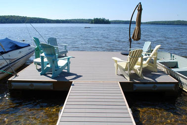 Prezzo buono La manutenzione all'aperto di Decking composito di plastica co--Extrution della tecnologia libera in linea
