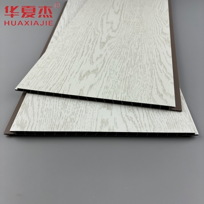 Prezzo buono pannello murale in PVC con venature del legno bianco pannelli in PVC impermeabili decorazione edilizia in linea
